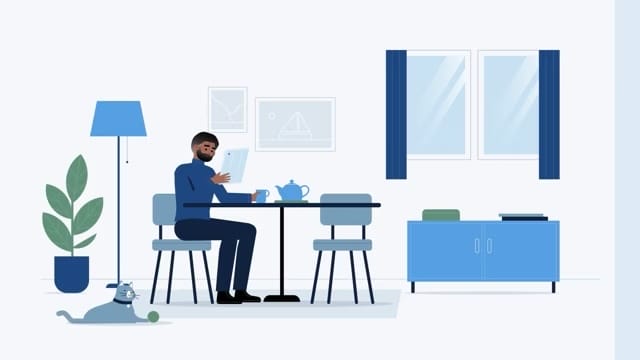 Man reading a book at dining table, blue-themed room, teapot and cup on table, cat playing with ball on floor.