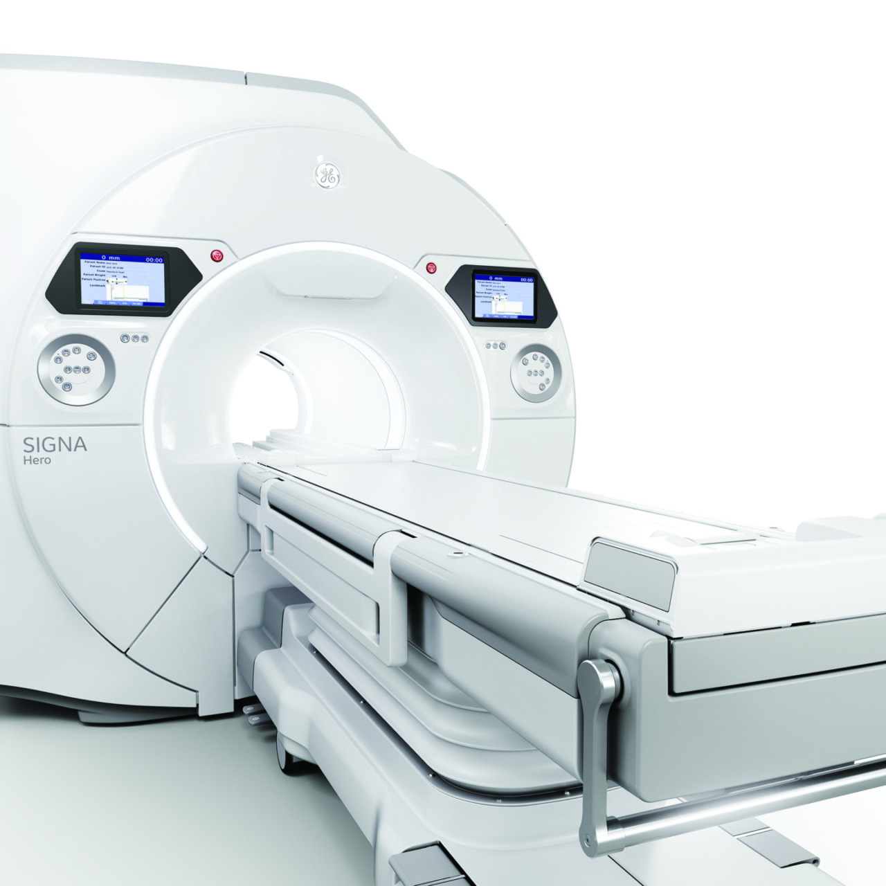 MRI machine in a medical setting with a white, sleek design and control panels on the side